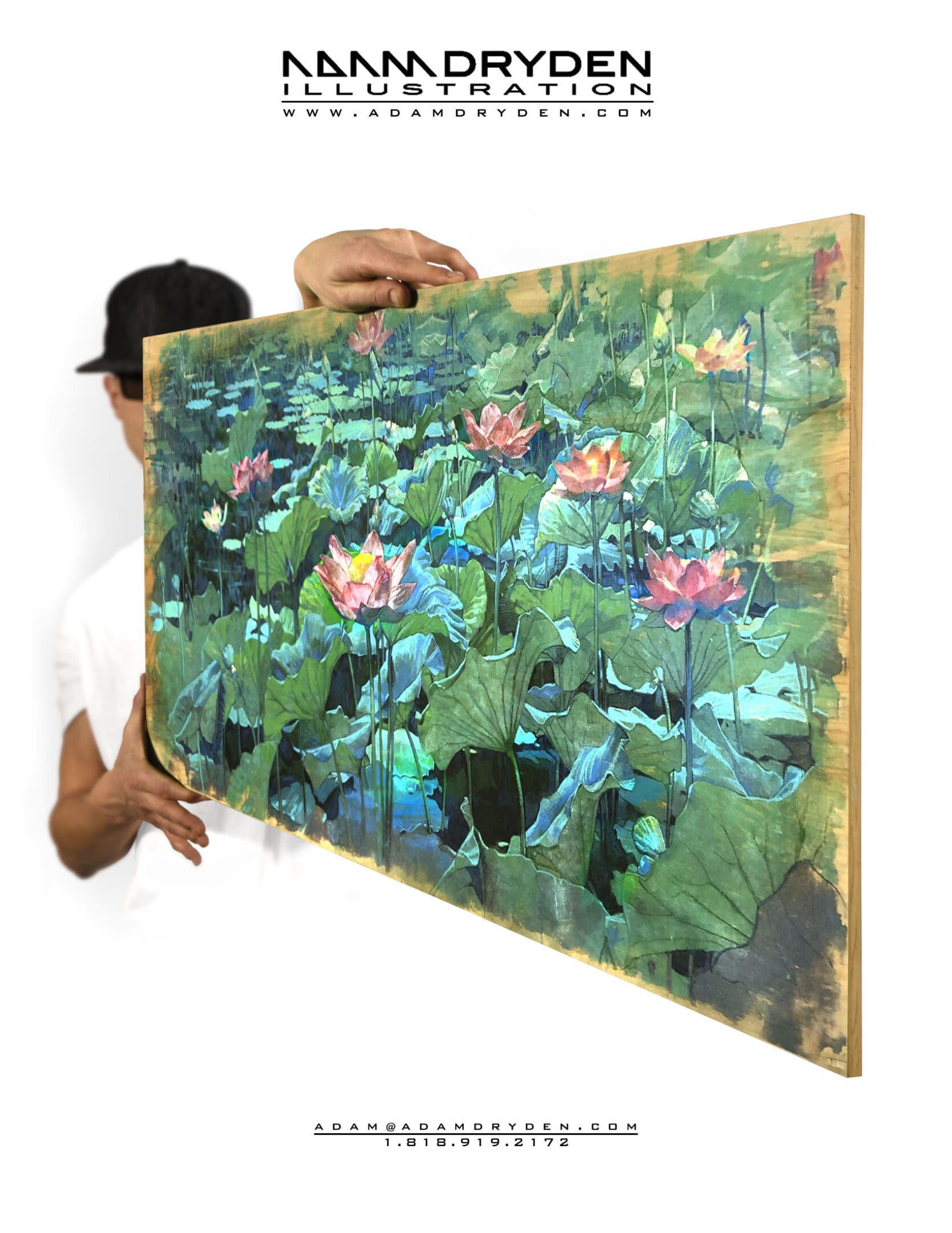 A man holding up a large painting of water lilies.