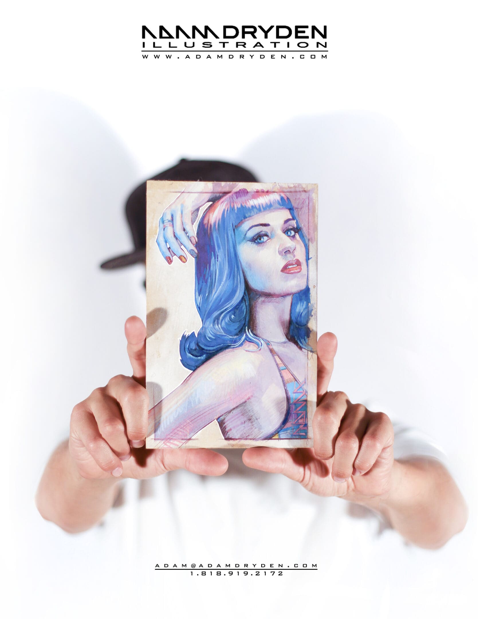 A person holding up a picture of katy perry